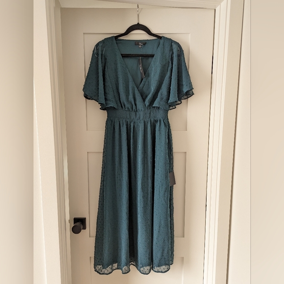 Lulus Dresses & Skirts - NWT Lulus transcendent class emerald swiss dot midi dress Small